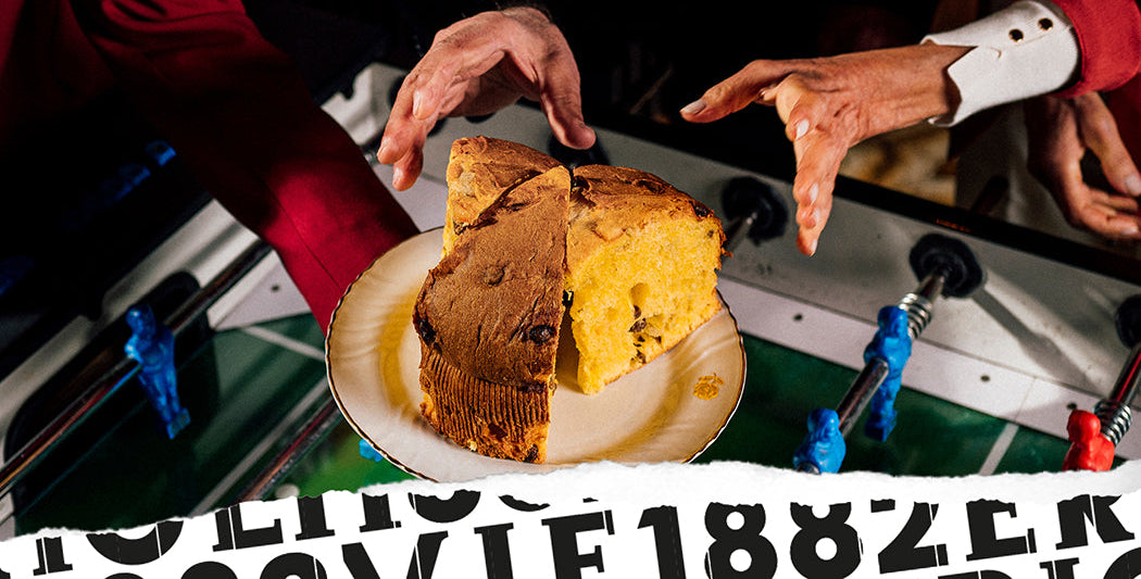 Two slices of panettone on a plate with friend pointing at it.